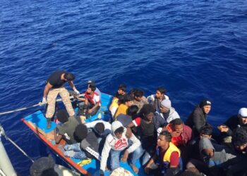 Migrants are seen in a dinghy as they are rescued by Libyan coast guards in the Mediterranean Sea off the coast of Libya, October 18, 2019. Picture taken October 18, 2019. REUTERS/Libyan Coast Guard/Handout via REUTERS  ATTENTION EDITORS - THIS IMAGE WAS PROVIDED BY A THIRD PARTY. - RC19B7903B10