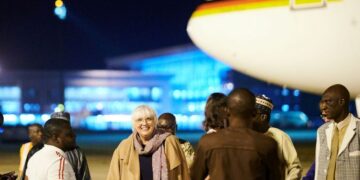 Germany's Minister of State for Culture and Media, Claudia Roth (2nd L) walks on the tarmac in Abuja. The focus of Germany's Foreign Minister and Culture Minister Roth's trip is the return of the Benin bronzes. For the first time, Germany is returning a valuable cultural treasure from colonial times to Nigeria. Photo: Annette Riedl/dpa