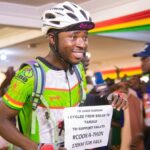 James Kumbeni poses for a picture after riding 170km from Bolga to Tamale to support Failatu's cook-a-thon attempt in January 2024. He will embark on a much longer journey from Bolga to Accra to support Joel Atinga break a Guinness World Record