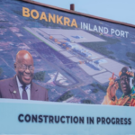 A billboard indicating construction work ongoing at the Boankra Inland Port