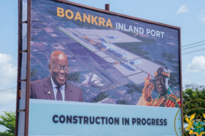 A billboard indicating construction work ongoing at the Boankra Inland Port