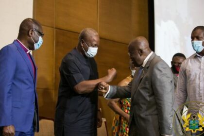 former President John Mahama greets Nana Akufo-Addo