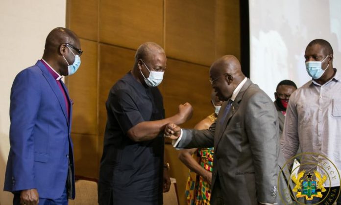 former President John Mahama greets Nana Akufo-Addo