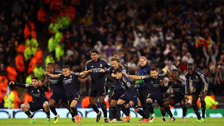 Real Madrid players celebrate their Champions League semi-final win over Manchester United at the Etihad. Madrid won 3-4 on penalties