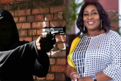 stock photo of armed robber and Sedina Tamakloe