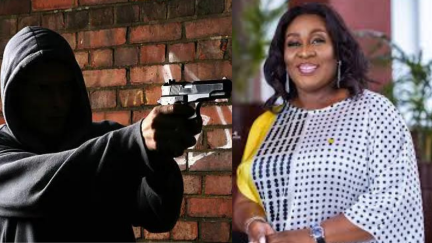 stock photo of armed robber and Sedina Tamakloe