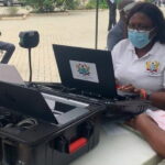 EC officials registering voters