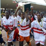 Ishmael Addo celebrates with Accra Hearts of Oak during their treble winning campaign in 2000
