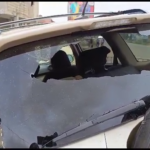 the windscreen of the car of the military man broken