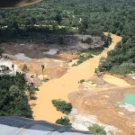 a river polluted by illegal mining also known as galamsey
