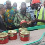 President Akufo-Addo tours a 1D1F factory that produces tomato paste