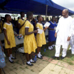 John Mahama with school children
