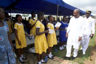 John Mahama with school children